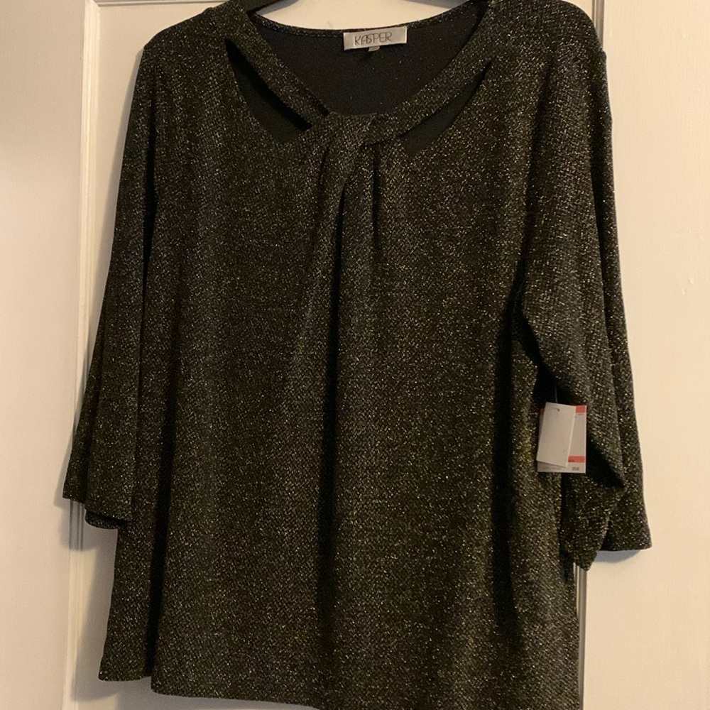 NWT. Black and gold top with twisted neckline.